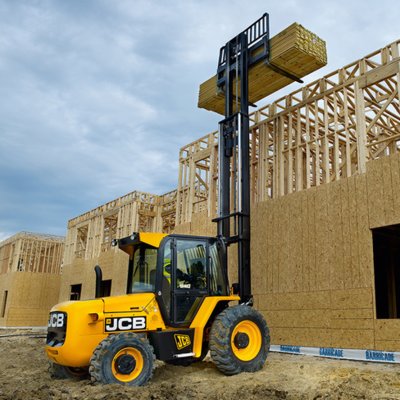 Forklift unloading machinery and industrial equipment in Purley